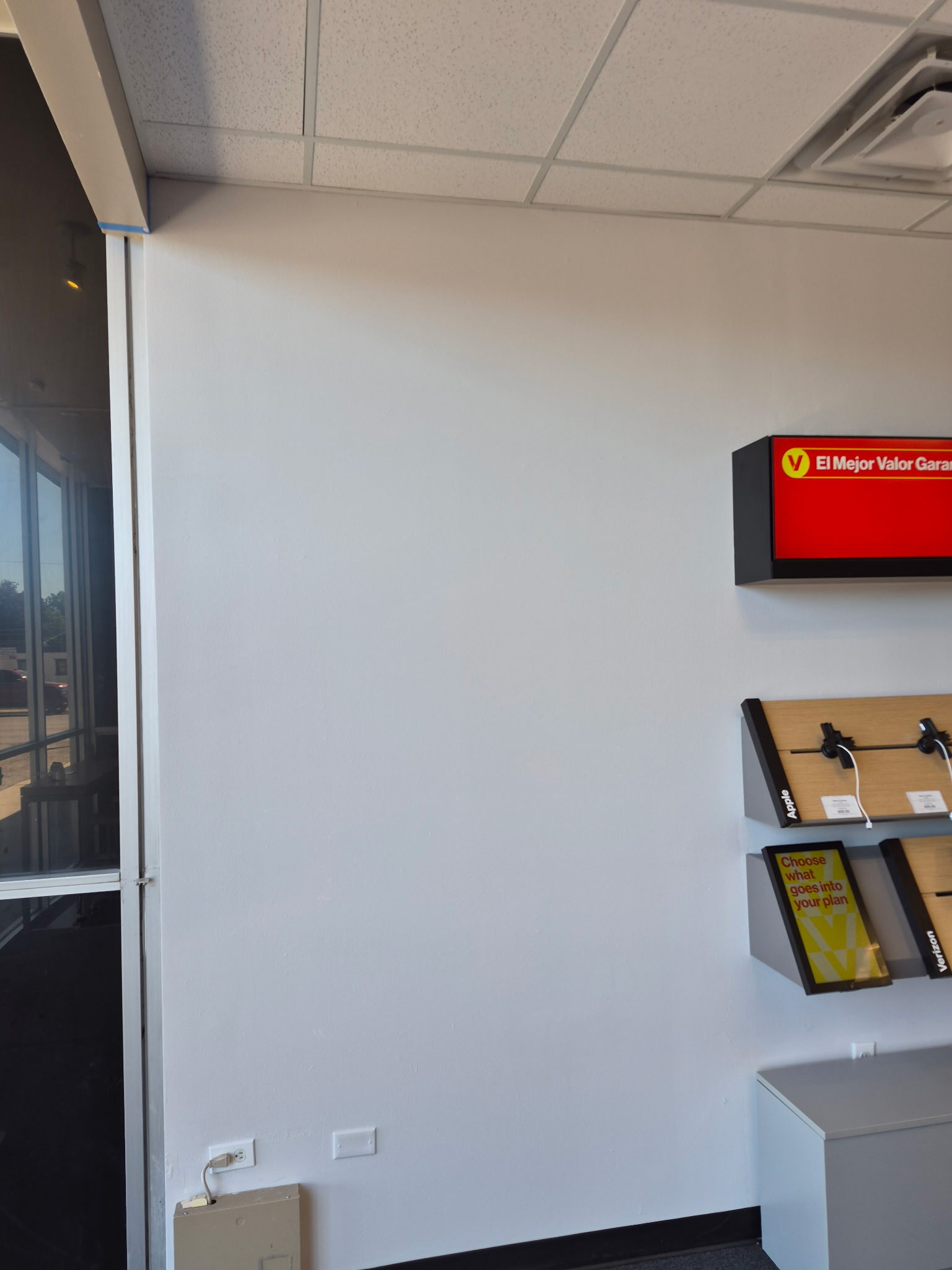 Verizon store painting in progress