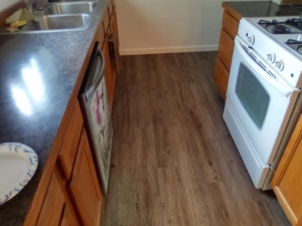 Dark LVP flooring in kitchen