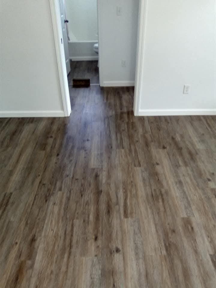 Hallway to bathroom LVP