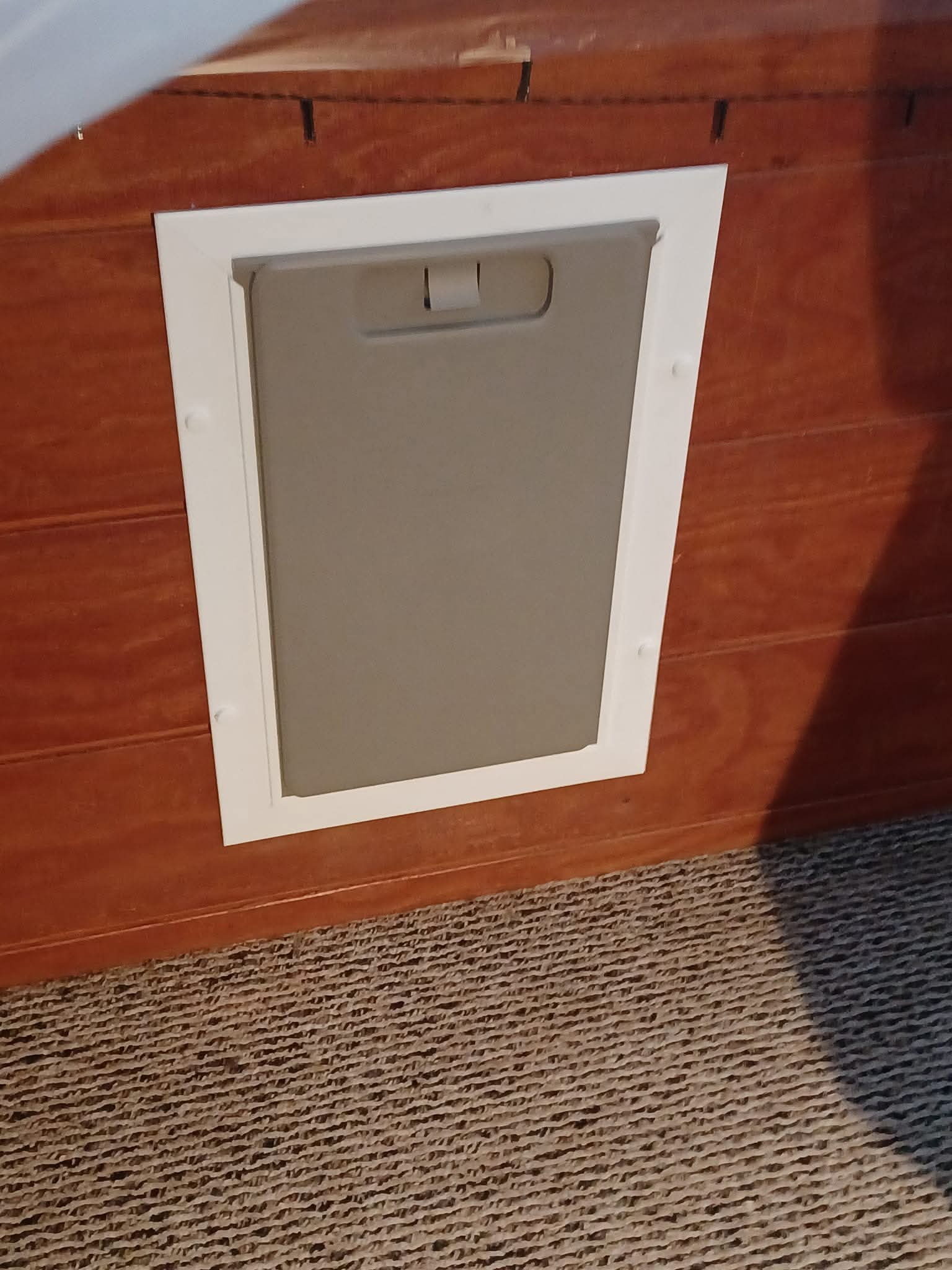 Pet door in outbuilding